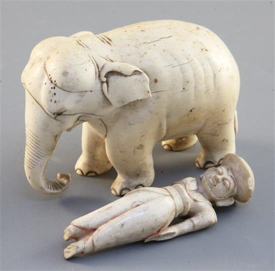 A 19th century Indian carved ivory elephant and an incomplete figure of an attendant 4.5in. & 4in.